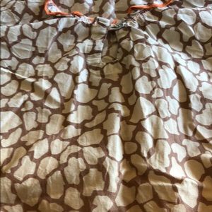 Orange and crean koi scrub